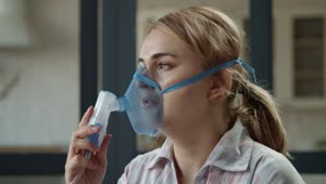 Stock Video Girl Using A Nebulizer With Mask Live Wallpaper For PC