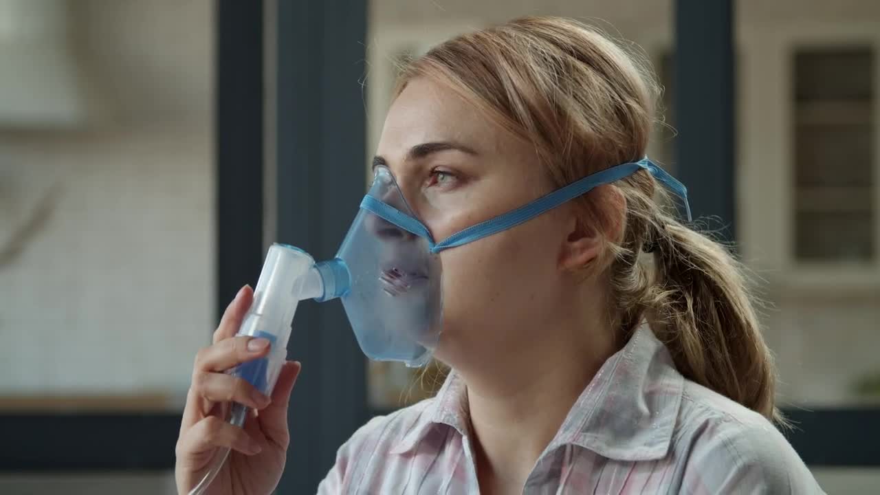 Download Stock Video Girl Using A Nebulizer With Mask Live Wallpaper For PC