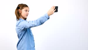 Download Stock Video Girl Taking Selfies With Her Cell Phone Live Wallpaper For PC