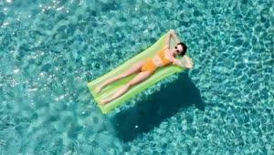 Stock Video Girl Sunbathing In The Swimming Pool Live Wallpaper For PC