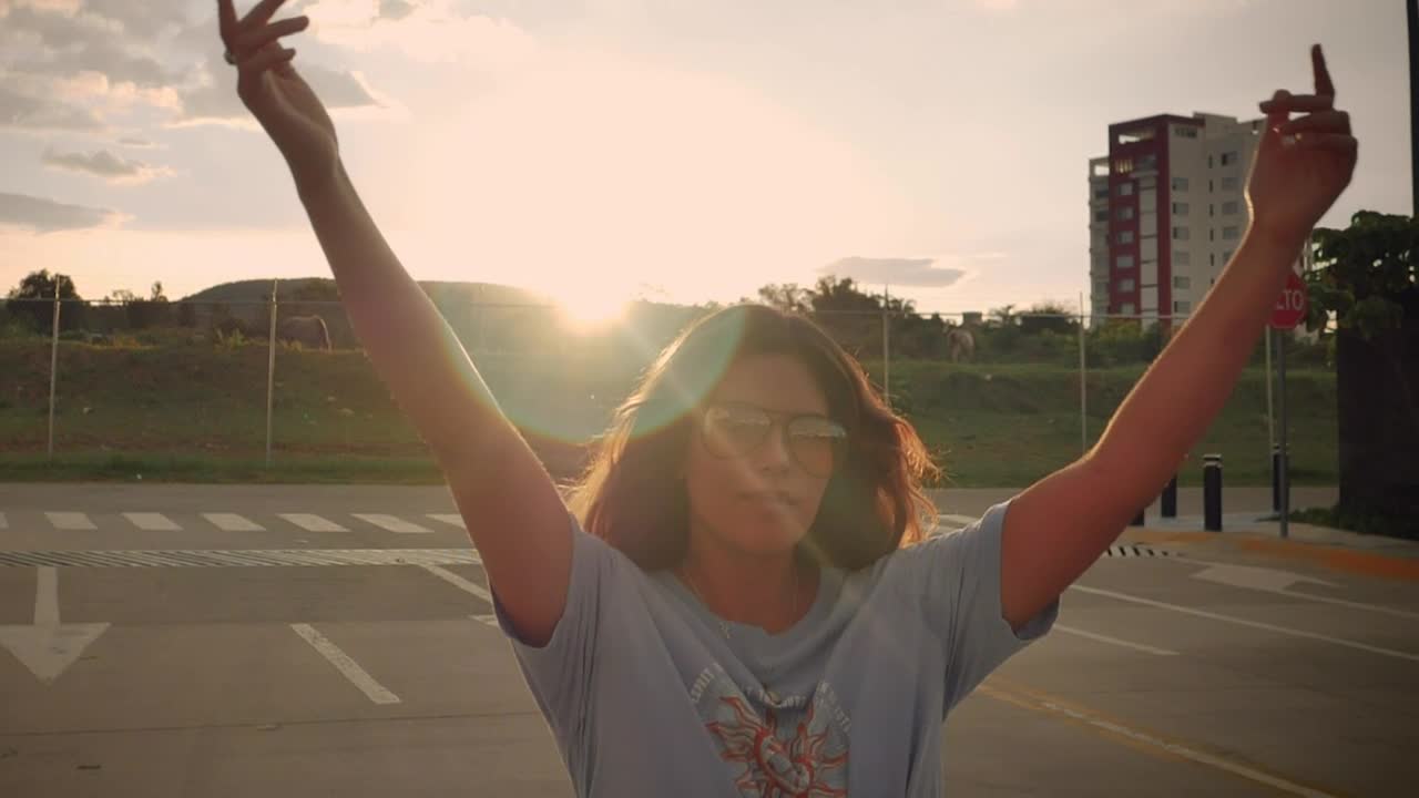 Download Stock Video Girl Skating Down The Street In A Close Shot Live Wallpaper For PC