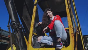 Stock Video Girl Sitting On A Tractor Live Wallpaper For PC