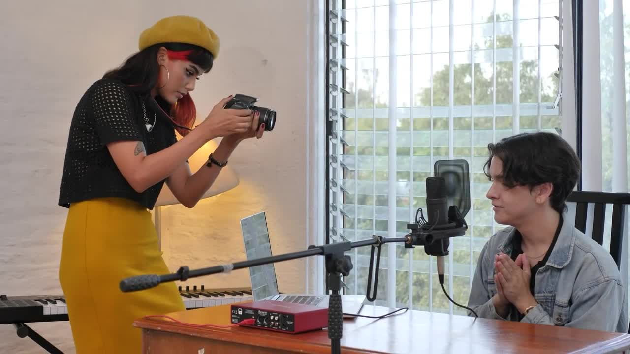 Download Stock Video Girl Recording A Influencer Sitting At A Desk Live Wallpaper For PC