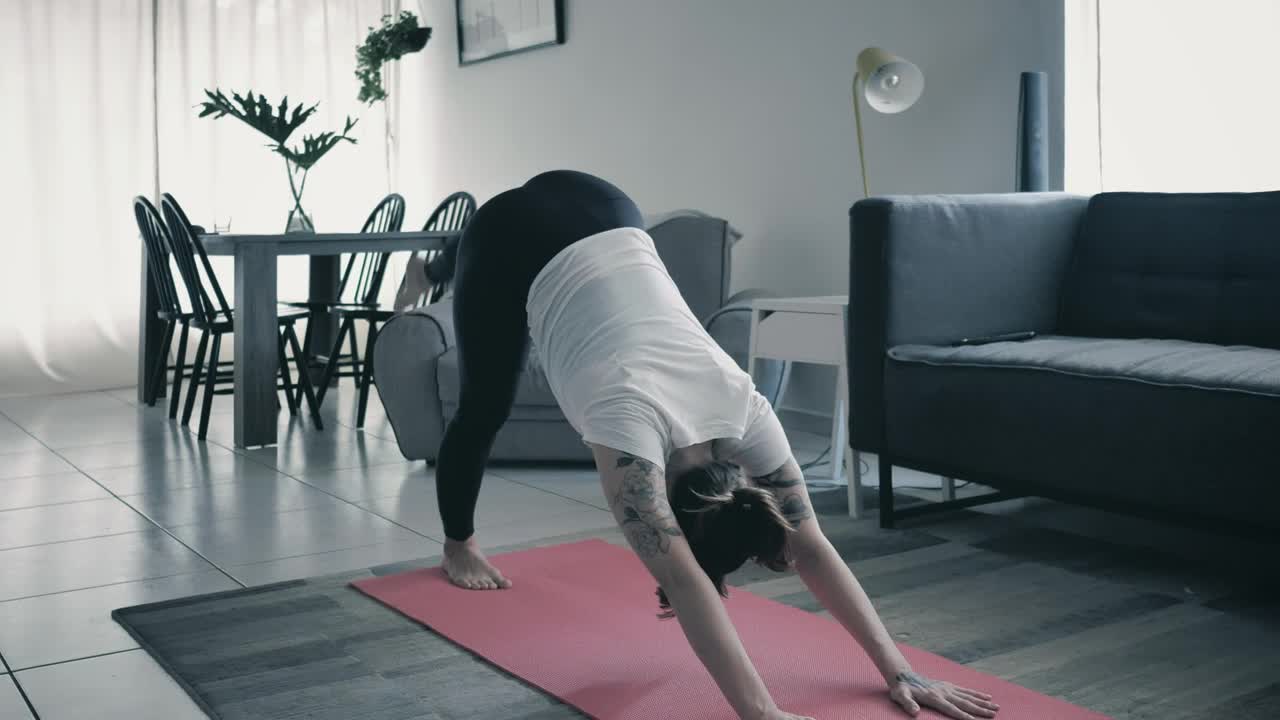 Download Stock Video Girl Practicing Yoga In A Living Room At Home Live Wallpaper For PC