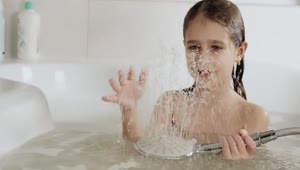 Stock Video Girl Playing With Water While Taking A Bath Live Wallpaper For PC