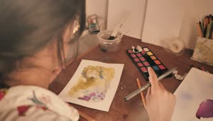 Stock Video Girl Painting A Picture In Watercolor During Video Call Live Wallpaper For PC