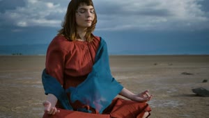 Stock Video Girl Meditating Under The Wind In The Desert Live Wallpaper For PC