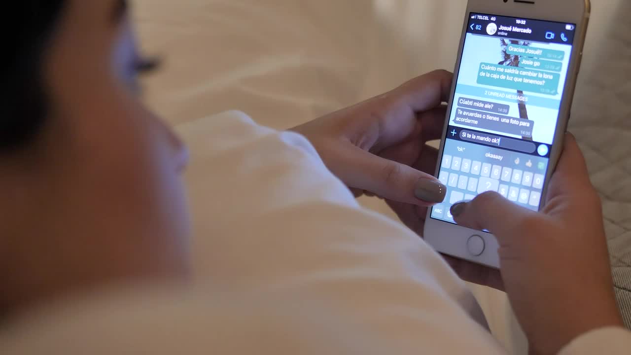 Download Stock Video Girl Lying On Her Bed Chatting On Cell Phone Live Wallpaper For PC