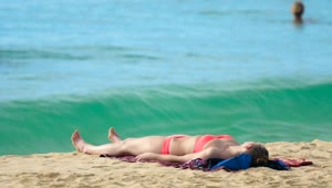 Stock Video Girl In Bikini Laying On The Beach Live Wallpaper For PC