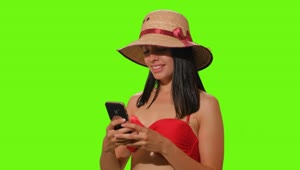 Stock Video Girl In Beachwear Takes A Selfie On Green Screen Live Wallpaper For PC