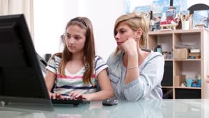 Stock Video Girl Confused By Homework Gets Help From Mom Live Wallpaper For PC