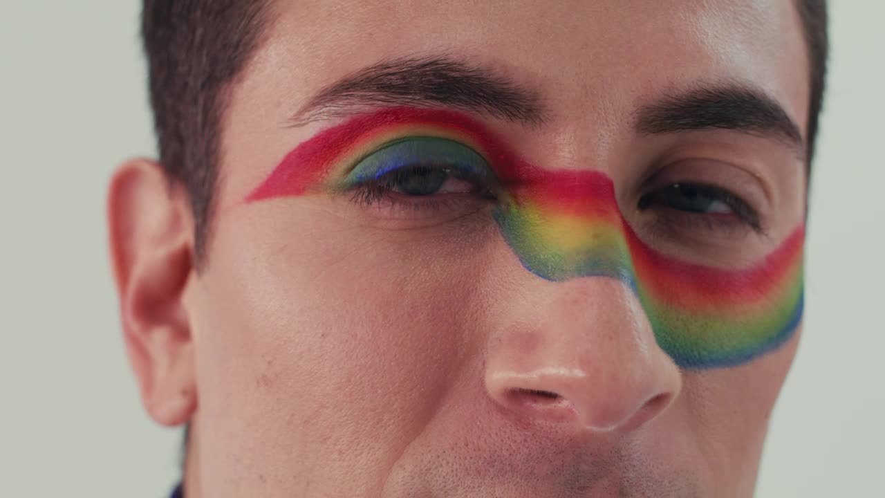 Download Stock Video Gaze Of An Lgbt Man With Rainbow Makeup Live Wallpaper For PC