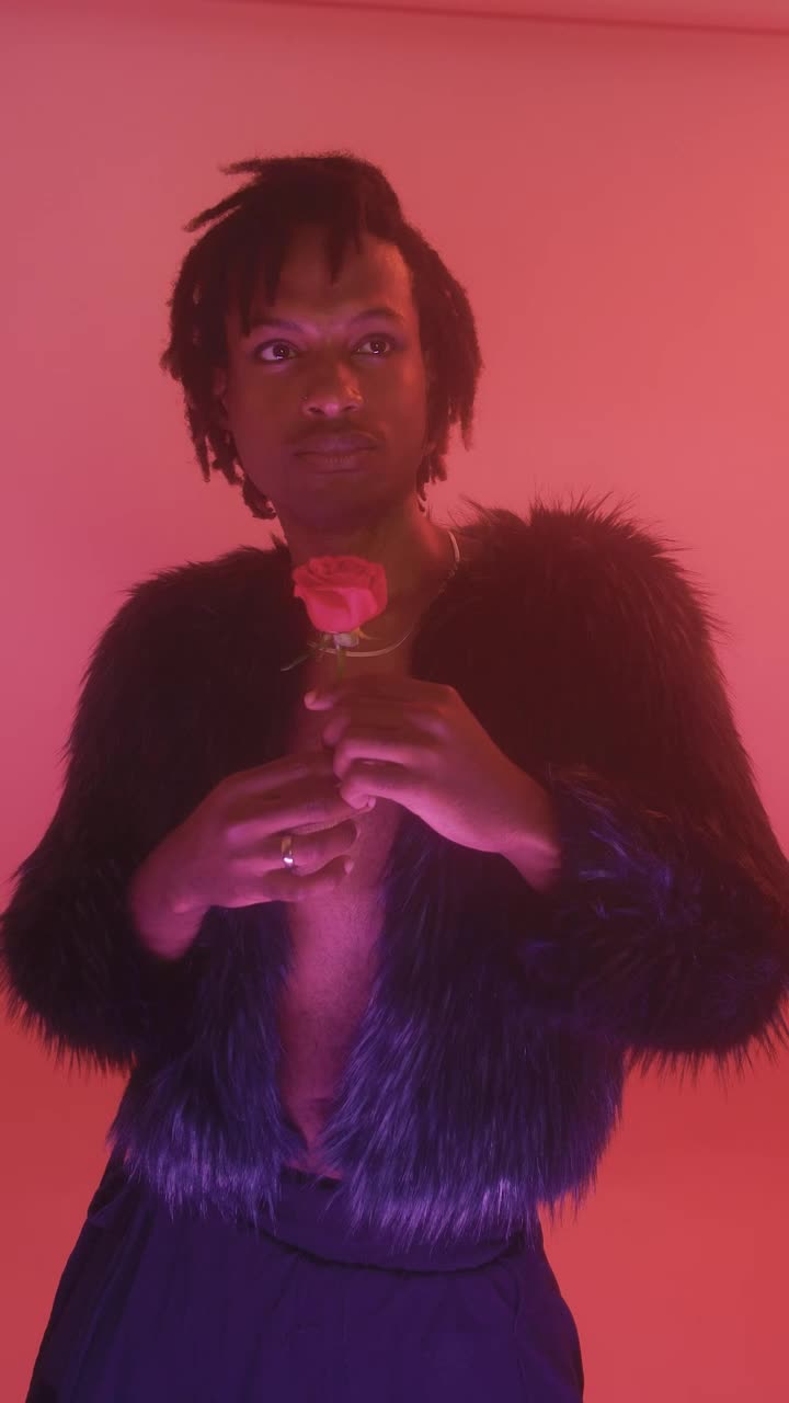 Download Stock Video Gay Man With A Flower On A Pink Background Live Wallpaper For PC