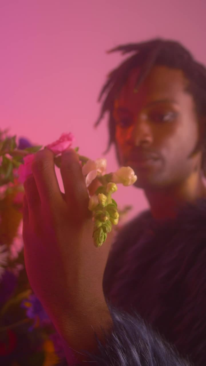 Download Stock Video Gay Man Appreciating Flowers In A Feminine Environment Live Wallpaper For PC