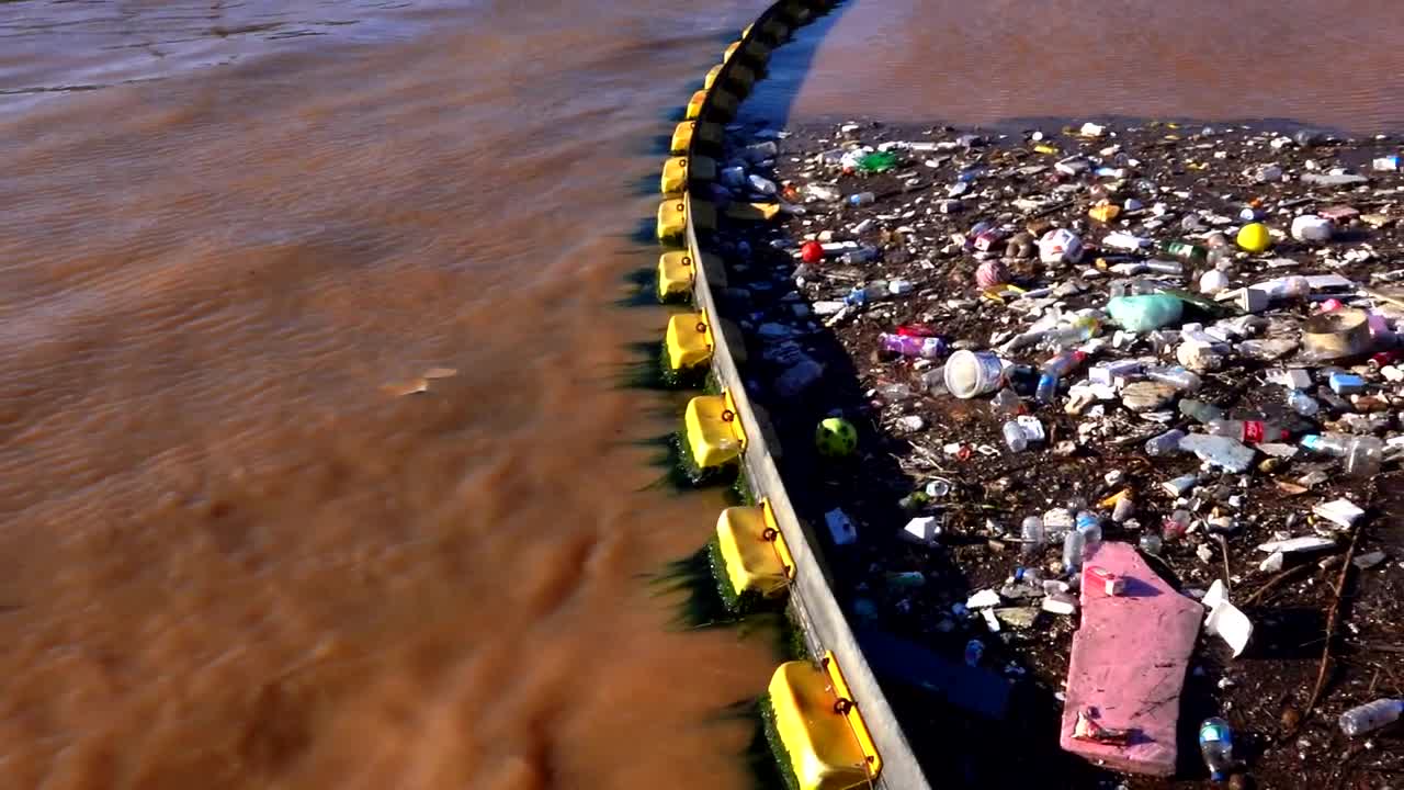 Download Stock Video Garbage Polluting The Water Of A Lake Live Wallpaper For PC