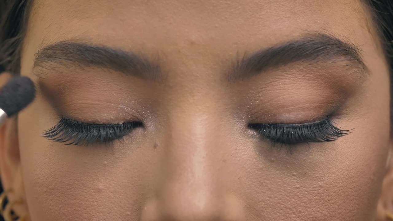 Download Stock Video Front Look Of A Woman While Being Made Up Live Wallpaper For PC