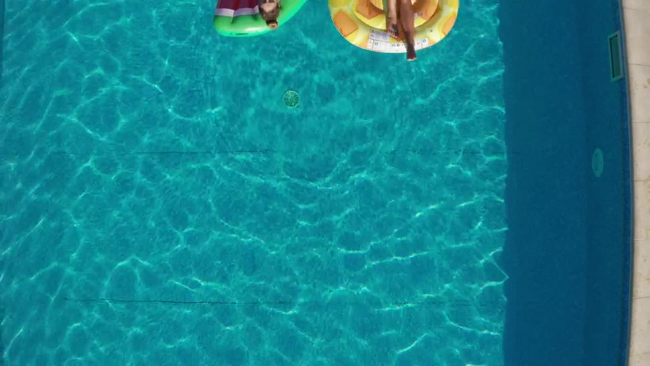 Download Stock Video Friends Relaxing On Pool Inflatables Live Wallpaper For PC