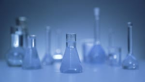 Stock Video Laboratory Flasks With Blue Liquid Animated Wallpaper