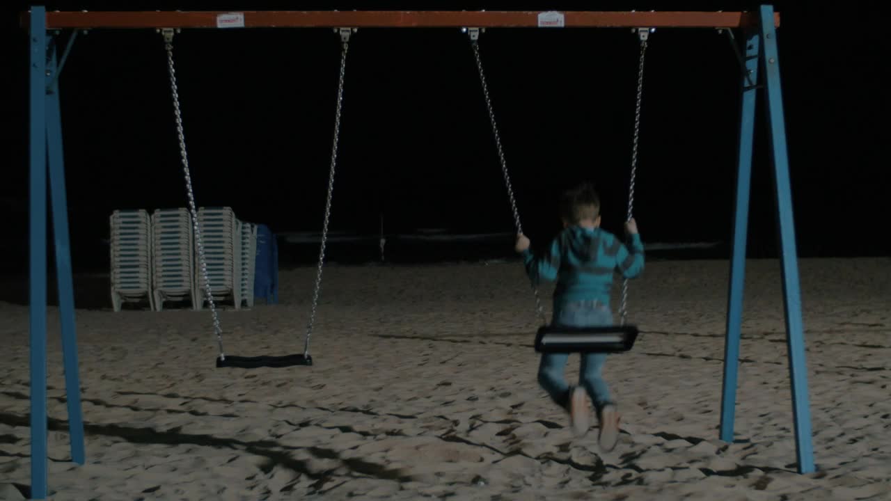 Download Stock Video Kid Alone On A Beach Swing Animated Wallpaper