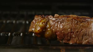 Stock Video Juicy Steak On The Grill Animated Wallpaper