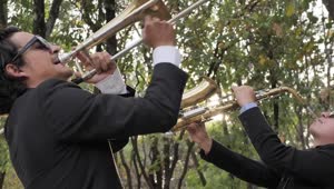 Stock Video Jazz Musicians Playing In A Park Animated Wallpaper