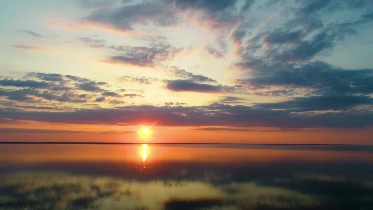 Download Stock Video Intense Sunset Reflected In The Sea Animated Wallpaper