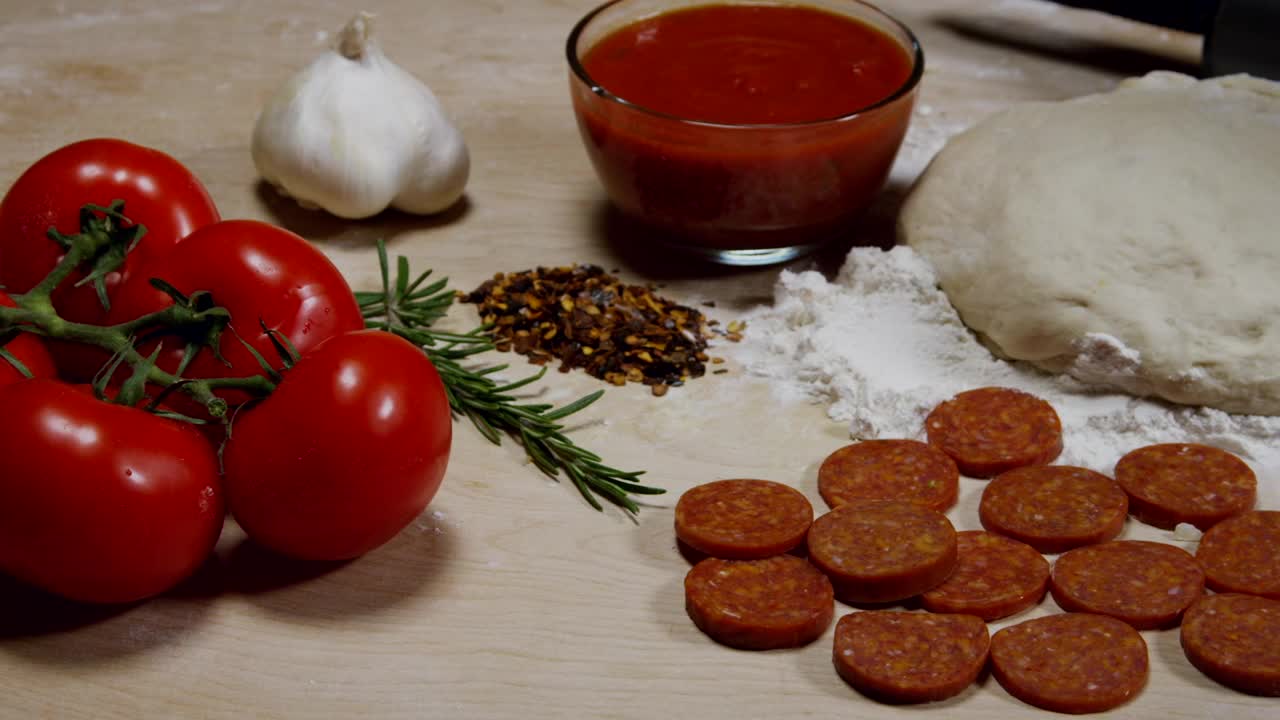 Download Stock Video Ingredient For A Home Made Pizza Animated Wallpaper