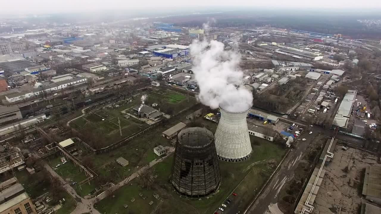Download Stock Video Industrial Tower With Smoke Animated Wallpaper