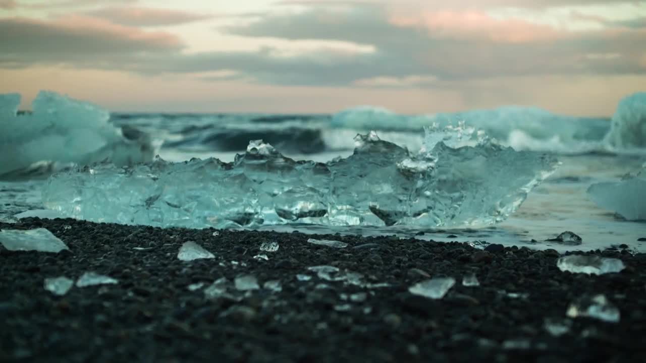 Download Stock Video Ice Between Breaking Waves Animated Wallpaper