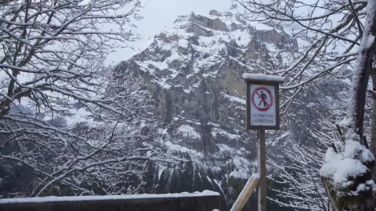 Download Stock Video Ice And Snow Covered Fence In The Mountains Animated Wallpaper