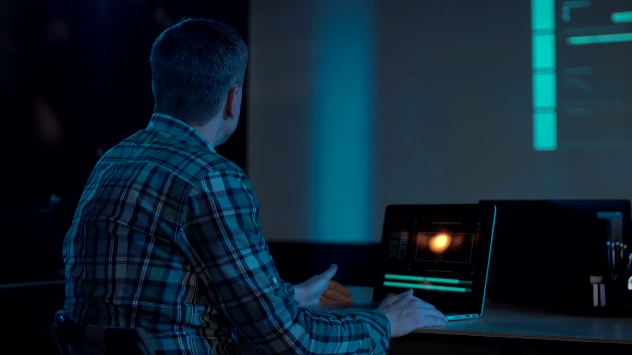 Download Stock Video I Am Working With Laptop In The Office At Night Animated Wallpaper