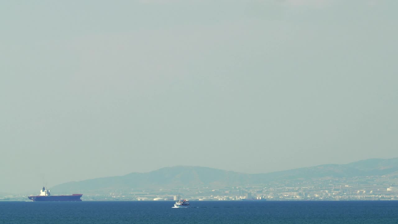 Download Stock Video Huge Ship Arriving At A Coastal City Animated Wallpaper