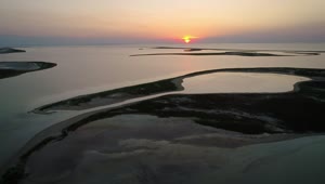 Stock Video Huge Lagoon From Above In A Sunset Animated Wallpaper