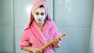 Stock Video Housewife With A Face Mask Upset With A Roller Animated Wallpaper