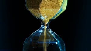 Stock Video Hourglass With Golden Sand Animated Wallpaper