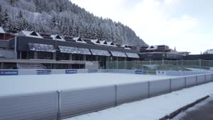 Stock Video Hotel In The Mountains With Sports Field Covered In Snow Animated Wallpaper