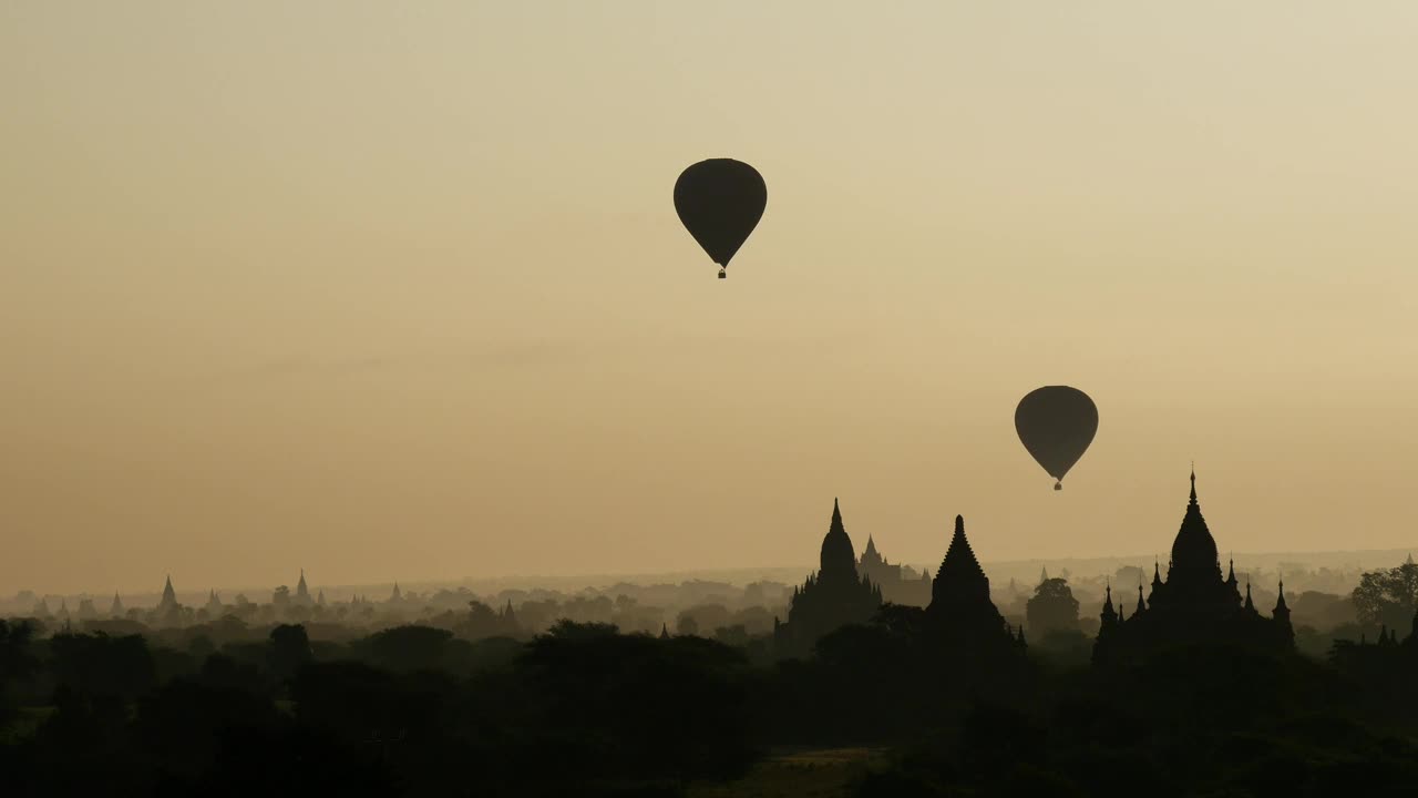 Download Stock Video Hot Air Balloons Flying During Sunrise Animated Wallpaper