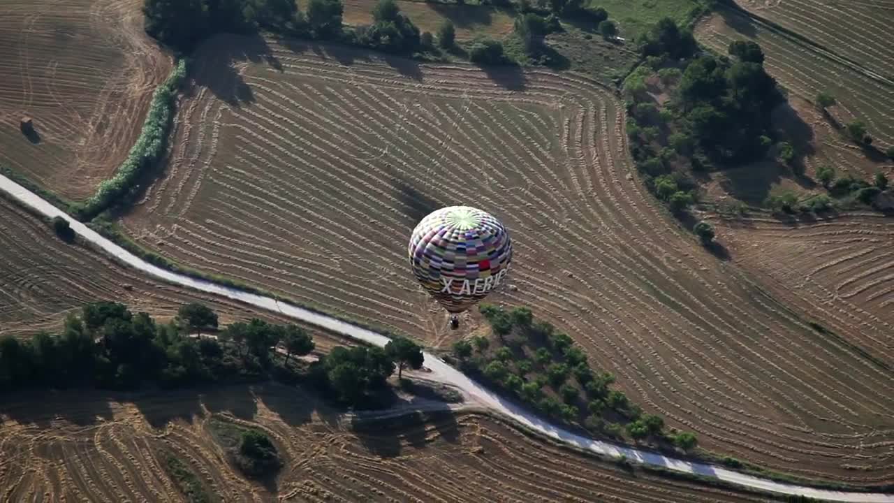 Stock Video Hot Air Balloon Flying Over The Fields Animated Wallpaper