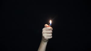 Stock Video Holding Up A Lighter Animated Wallpaper