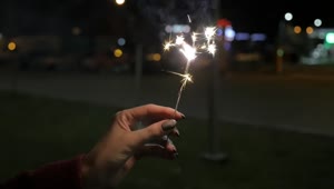 Stock Video Holding A Sparkler At Night Animated Wallpaper