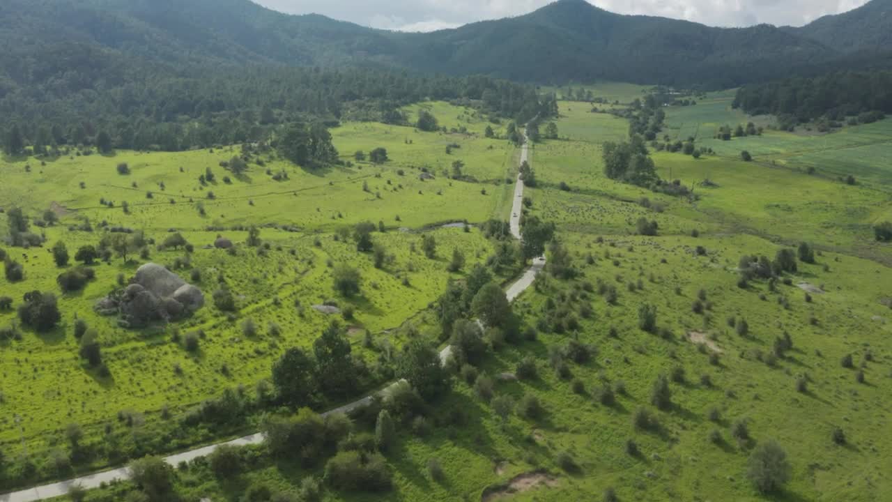 Download Stock Video Highway Crossing Between Huge Fields In Nature Animated Wallpaper