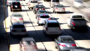 Stock Video High View Of Traffic From A Four Lane Highway Animated Wallpaper