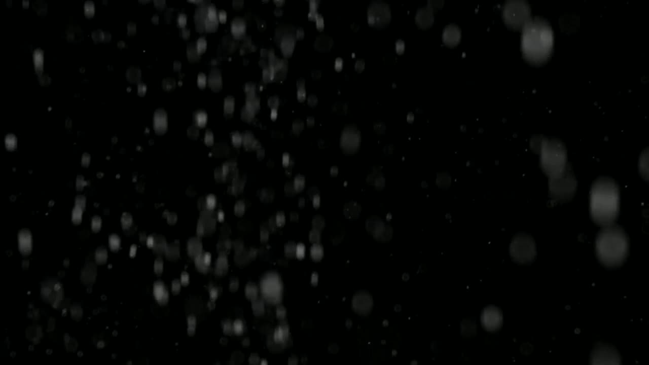 Download Stock Video Heavy Snow Falling On A Dark Background Animated Wallpaper