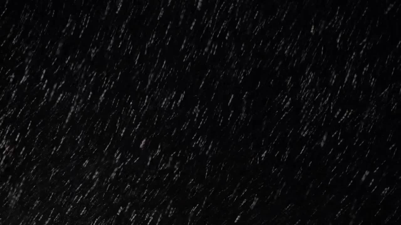 Download Stock Video Heavy Snow Against A Night Sky Animated Wallpaper