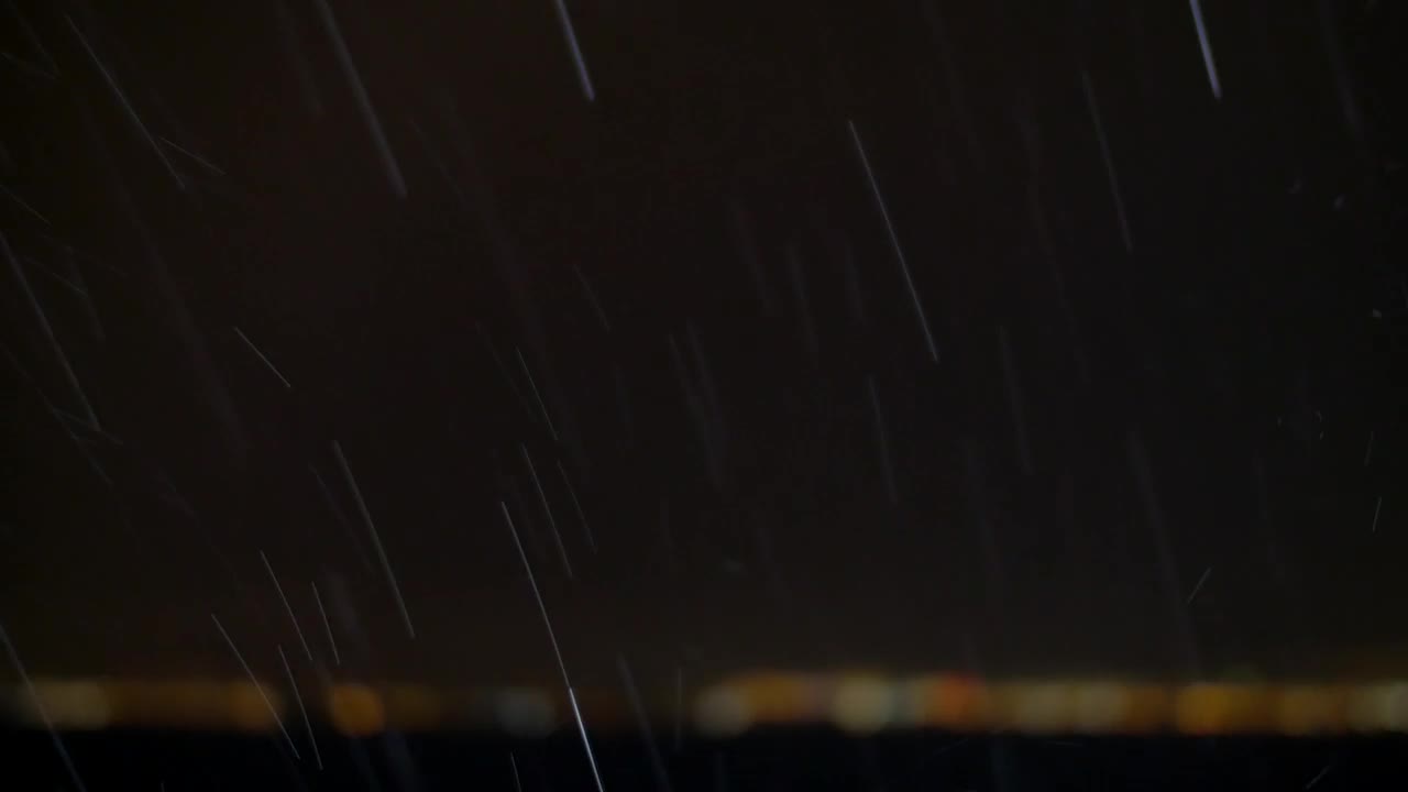 Download Stock Video Heavy Rain Over The Ocean At Night Animated Wallpaper