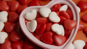 Stock Video Heart Shaped Candy In White And Red Color Animated Wallpaper