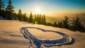 Stock Video Heart Shape In The Snow Mountains At Sunset Animated Wallpaper