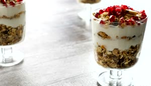 Stock Video Healthy Diet Breakfast Idea With Granola Yogurt Animated Wallpaper