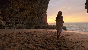 Stock Video Happy Woman Runs On Bali Beach At Sunset Animated Wallpaper