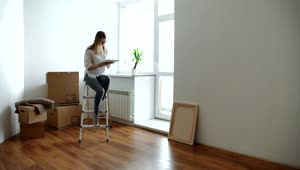 Stock Video Happy Woman Moving To Her New Apartment Animated Wallpaper